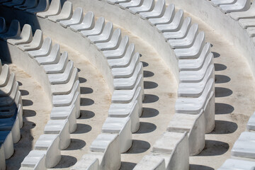 Empty plastic seats in outdoor theater for shows. Resort in Turkey