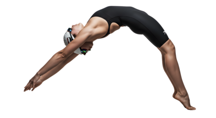 Female swimmer performing a graceful dive into a pool, with a clear blue water background and bright lighting