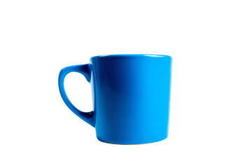 a blue coffee cup sitting on top of a white table