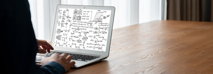 Mathematic equations and modish formula on computer screen showing concept of science and education