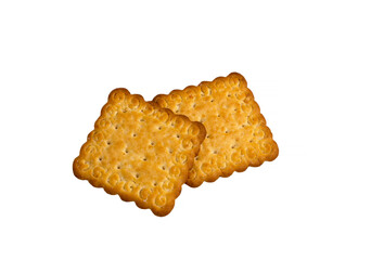 Dry salty cracker biscuits are isolated on a white background. Square crackers in close-up on a white background, top view. a delicious snack.