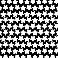 repeating pattern of white stars on a black background