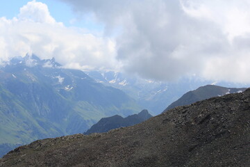 mountain peaks of elbrus region in dombai in midsummer