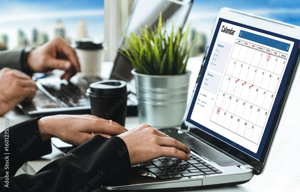 Poster calendar on computer software application for modish schedule planning for personal organizer and on