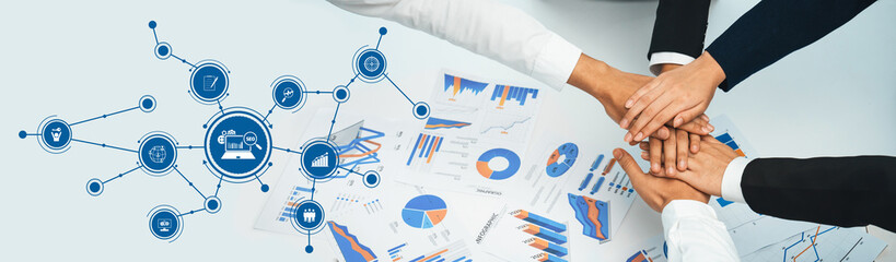 Analyst team putting hand together after successful plan of business strategy and marketing....