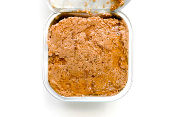Wet cat food pate on the table.