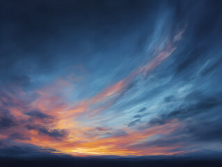 Obraz premium Dramatic sunset sky with fiery clouds and deep blue hues