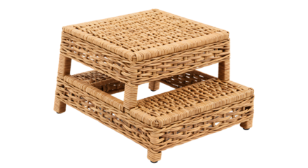 A beautifully woven wicker display stand featuring two tiers, ideal for showcasing decorative items in a cozy interior setting