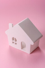House, buying or selling real estate, concept background with money and piggy bank. Real estate
