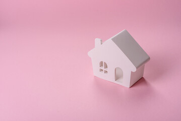 House, buying or selling real estate, concept background with money and piggy bank. Real estate