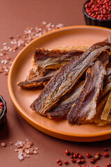 Dried salted fish as snacks or jerky, seafood as slices. Dried seafood snacks