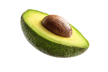 A green avocado with a brown seed in the middle