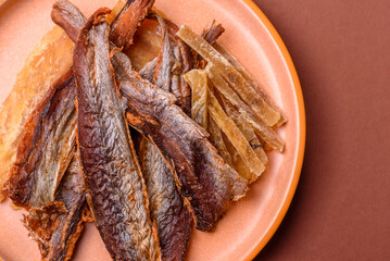 Dried salted fish as snacks or jerky, seafood as slices. Dried seafood snacks