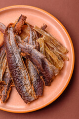Dried salted fish as snacks or jerky, seafood as slices. Dried seafood snacks