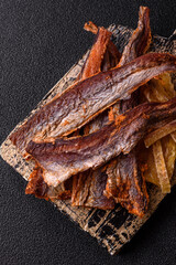 Dried salted fish as snacks or jerky, seafood as slices. Dried seafood snacks