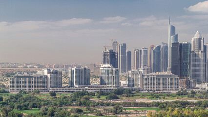 Dubai Marina skyscrapers and golf course morning timelapse, Dubai, United Arab Emirates