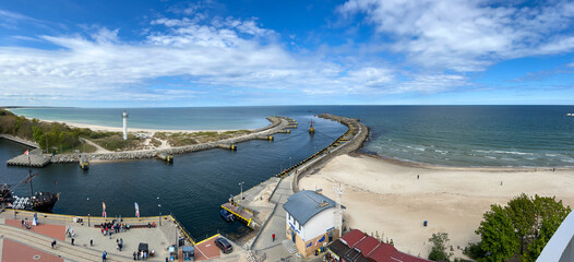 The entrance to the port of Kolobrzeg on the Baltic Sea in Poland, seen from above from the old...