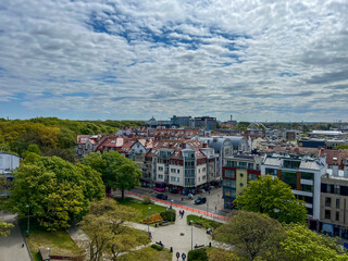 Fototapeta premium The city of Kolobrzeg on the Baltic Sea in Poland, viewed from above from the old lighthouse