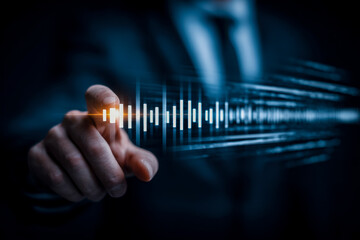 Businessman interacting with digital sound wave visualization