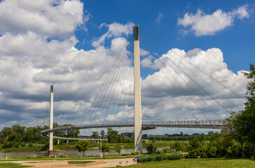 The Bob Kerrey Pedestrian Bridge crosses over the Missouri river, connecting Omaha, Nebraska with Council Bluffs, Iowa