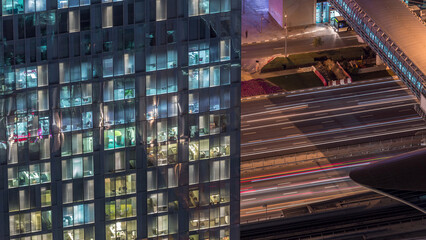 Night view of exterior apartment tower timelapse. High rise skyscraper with blinking lights in windows © HyperlapsePro