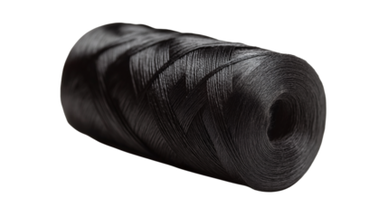 A single strand of black thread neatly coiled and isolated on a clean white background or transparent png 
