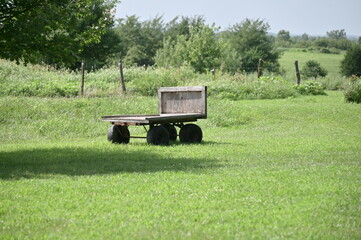 Wooden Wagon in a Farm Field