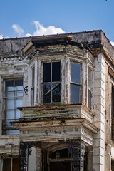 Decaying Elegance: A Gritty Bay Window
