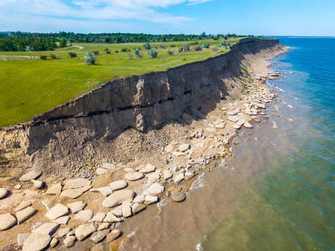 Scenic aerial view of lake Sakakawea shoreline at sunset in North Dacota - Powered by Adobe