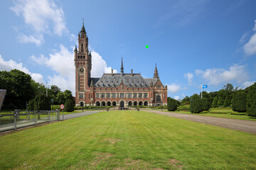 Exterior of The Hague's Peace Palace against a blue sky