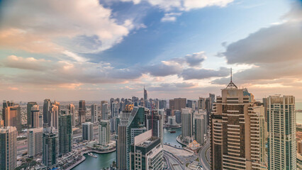Dubai Marina skyscrapers and jumeirah lake towers view from the top aerial timelapse in the United...