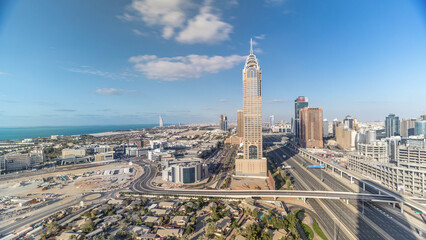Skyline internet city with crossing Sheikh Zayed Road aerial timelapse