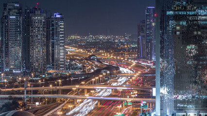 Dubai Marina and JLT aerial night timelapse top view of skyscrapers in Dubai, UAE.