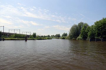 Vertical lift bridse Hoge Gouwespoorbrug over the Gouwe Canal in Gouda city