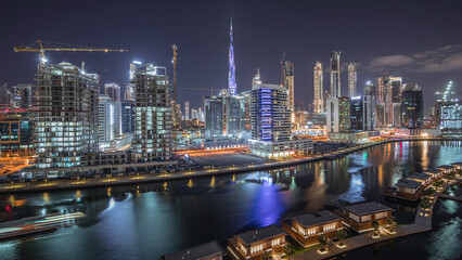 Obraz premium The rhythm of the city of Dubai near canal aerial timelapse