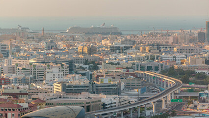 Obraz premium View of houses in luxury Dubai city, United Arab Emirates Timelapse Aerial