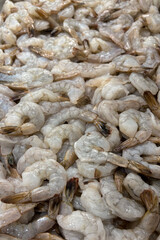 Closeup of fresh raw uncooked prawns on a fishmongers stall