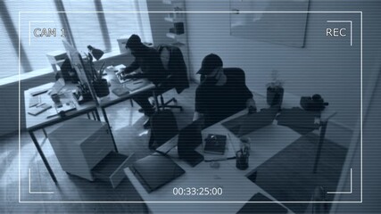 Security camera footage of two masked male criminals hacking into corporate computers then passing folder with documents searching for confidential database of clients during industrial espionage - Powered by Adobe