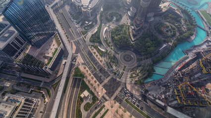 Dubai downtown street with busy traffic and skyscrapers around timelapse.