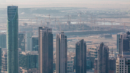 Naklejka premium Amazing aerial view of Dubai downtown skyscrapers timelapse, Dubai, United Arab Emirates