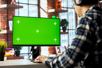 Employee at work watching videos on social media using isolated screen PC. Worker using social...