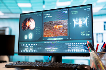 Professional healthcare office with diagnostic tools and a pc display, showcasing a designated...