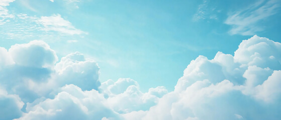 Bright blue sky with fluffy white clouds under soft sunlight, creating a serene and peaceful atmosphere.