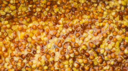 Mustard, French Dijon mustard sauce with whole seeds background. Grainy texture. French pickled mustard seeds sauce texture. Top view, flat lay, from above