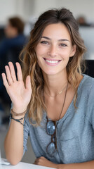 Friendly wave and warm smile welcoming gesture in office environment