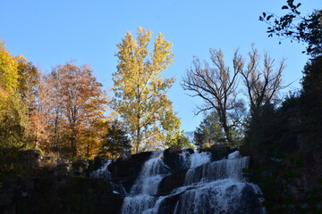waterfall in autumn park