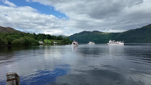 Tarbet Argyll Scotland UK. 12.07.2025. Video. Loch Fyne at Tarbet  in the Trossachs national paek Western Scotland. Loch Lomond cruise boat operating on Loch Fyne with tourists aboard,