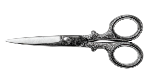 Vintage ornate scissors with intricate silver metalwork on a plain transparent background