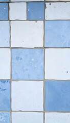 Old blue white gray vintage shabby patchwork tiles stone concrete cement wall texture background, dreamy atmosphere. White tone
