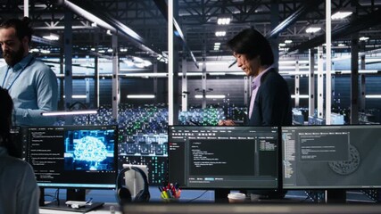 Team of engineers doing brainstorming in server room using AI to review infrastructure diagnostics. Teamworking IT colleagues in data center analyzing data using artificial intelligence, camera A - Powered by Adobe